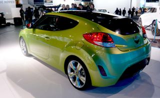 Green new model car in auto show