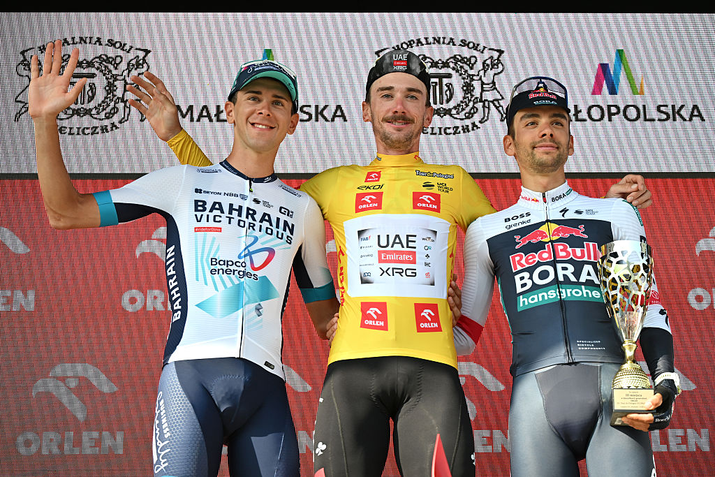 WIELICZKA, POLAND - AUGUST 10: (L-R) Antonio Tiberi of Italy and Team Bahrain - Victorious on second place, overall race winner Brandon McNulty of The United States and UAE Team Emirates - XRG - Yellow Leader Jersey and Matteo Sobrero of Italy and Team Red Bull - BORA - hansgrohe on third place pose on the podium ceremony after the 82nd Tour de Pologne 2025, Stage 7 a 12.5km individual time trial stage from Wieliczka to Wieliczka / #UCIWT / on August 10, 2025 in Wieliczka, Poland. (Photo by Luc Claessen/Getty Images)