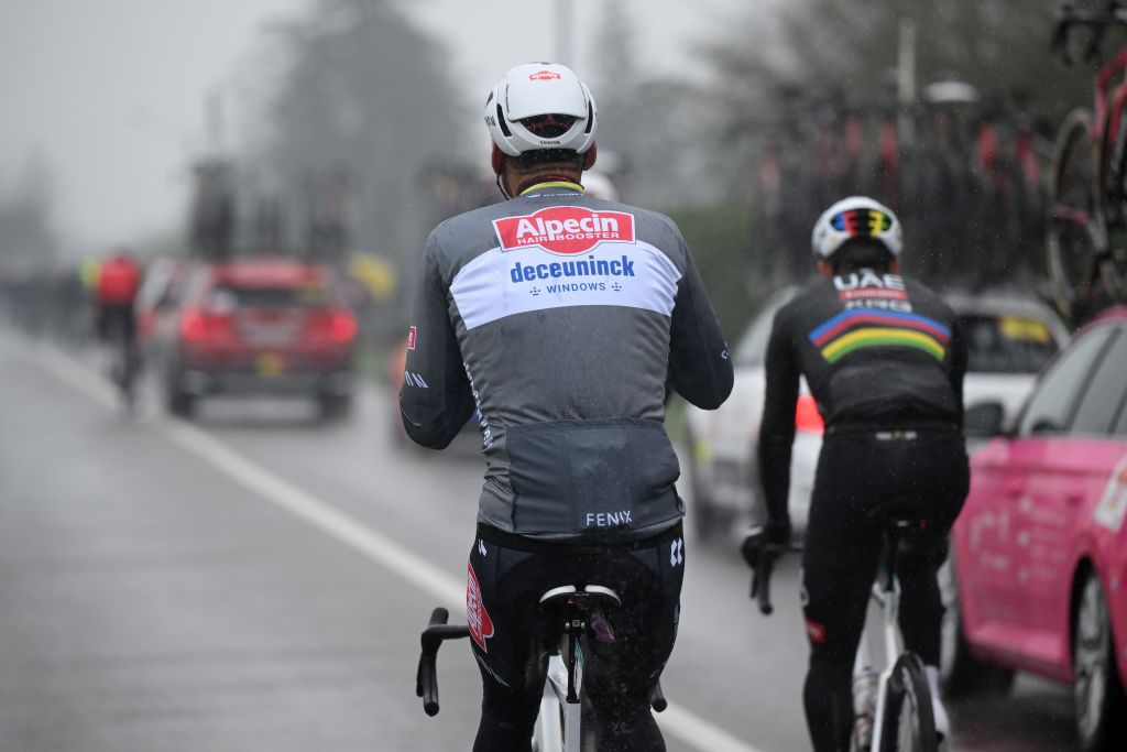 Mathieu van der Poel and Tadej Pogačar at the back of the peloton in the early kilometres of Milan-San Remo 2025