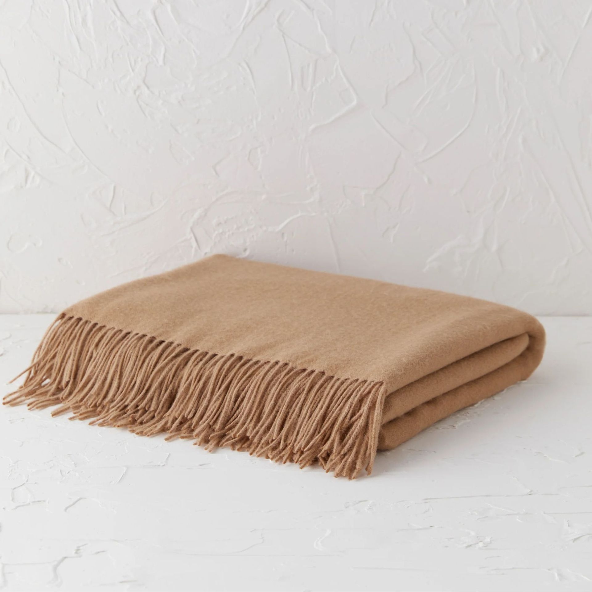 beige throw blanket