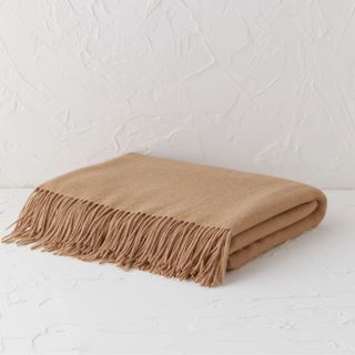 beige throw blanket