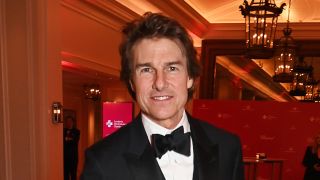 Tom Cruise looking suave London ambulance charity event in February. 