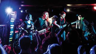 Voyager performing on stage in Camden