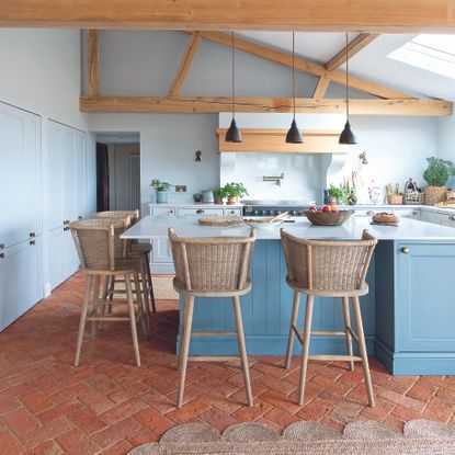 Blue kitchen in barn conversion