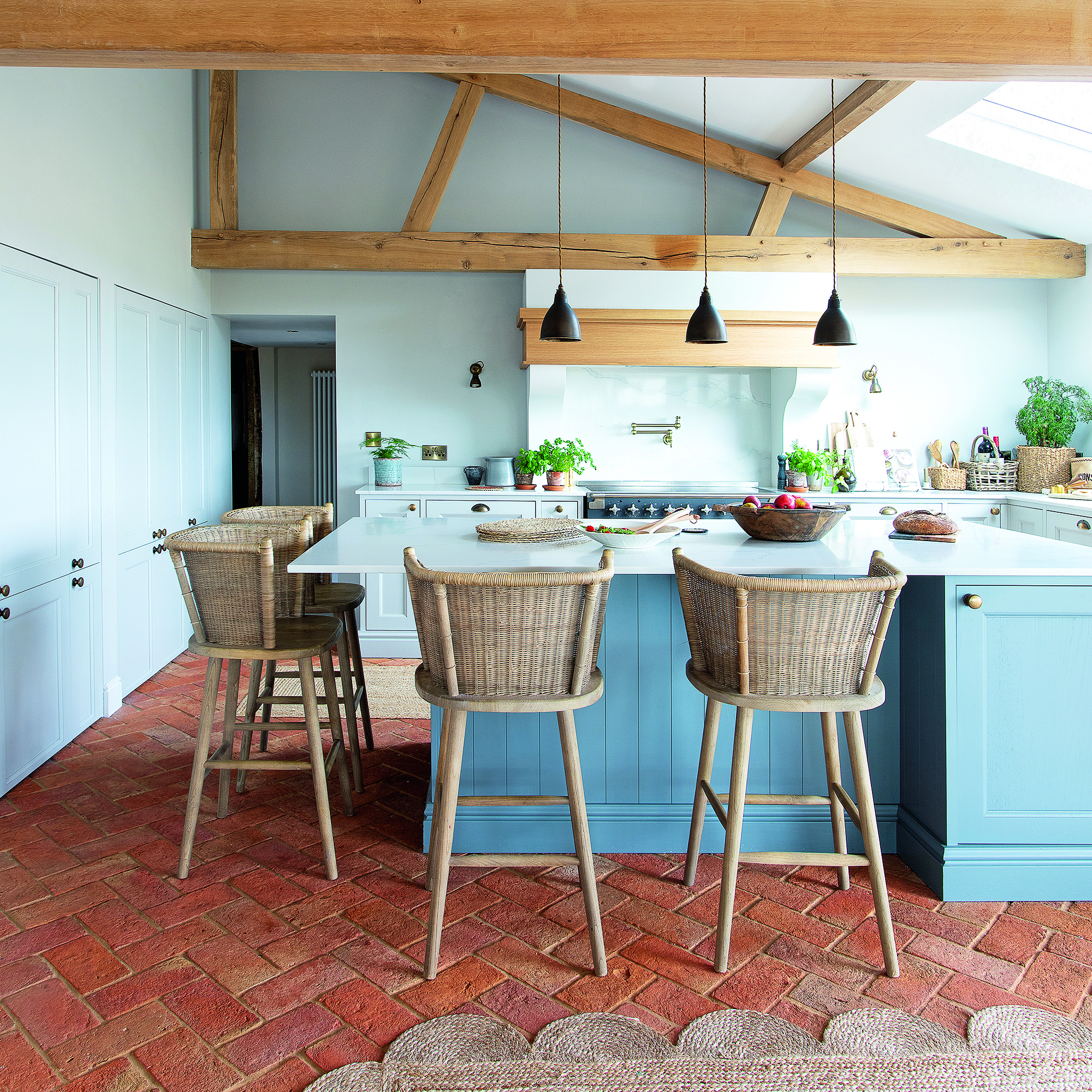 Blue kitchen in barn conversion