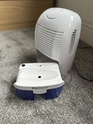 The ProBreeze 1500ml Mini Dehumidifier with water tank removed