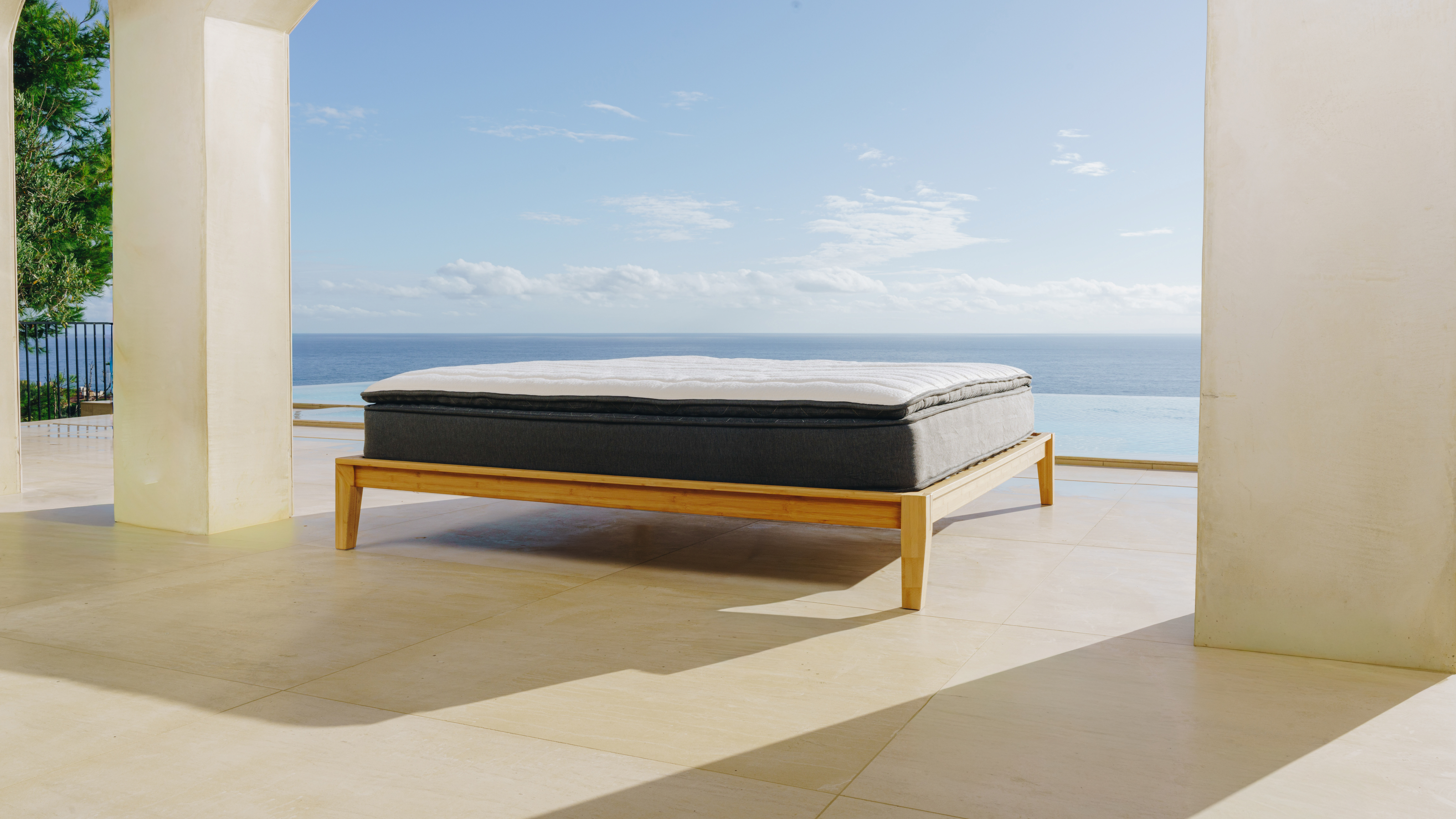 A Nell mattress with a seascape in the background