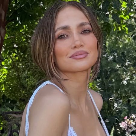 Jennifer Lopez matched her little white dress to a bikini on Memorial Day