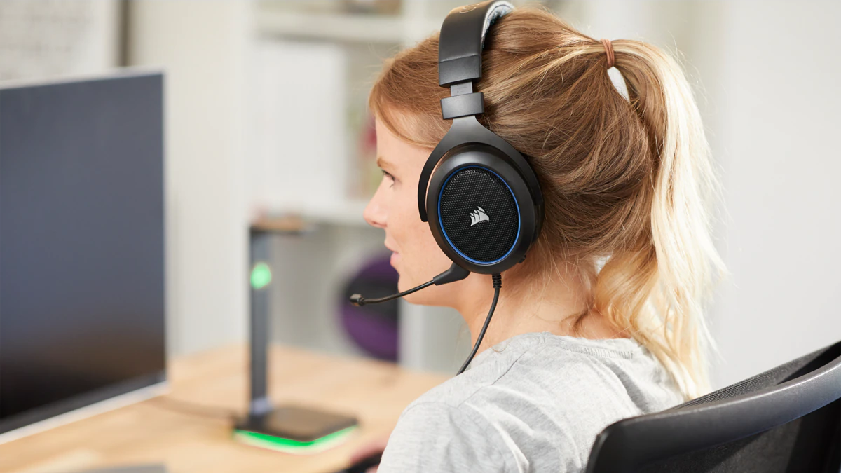 Corsair HS50 being used by a woman at her desk