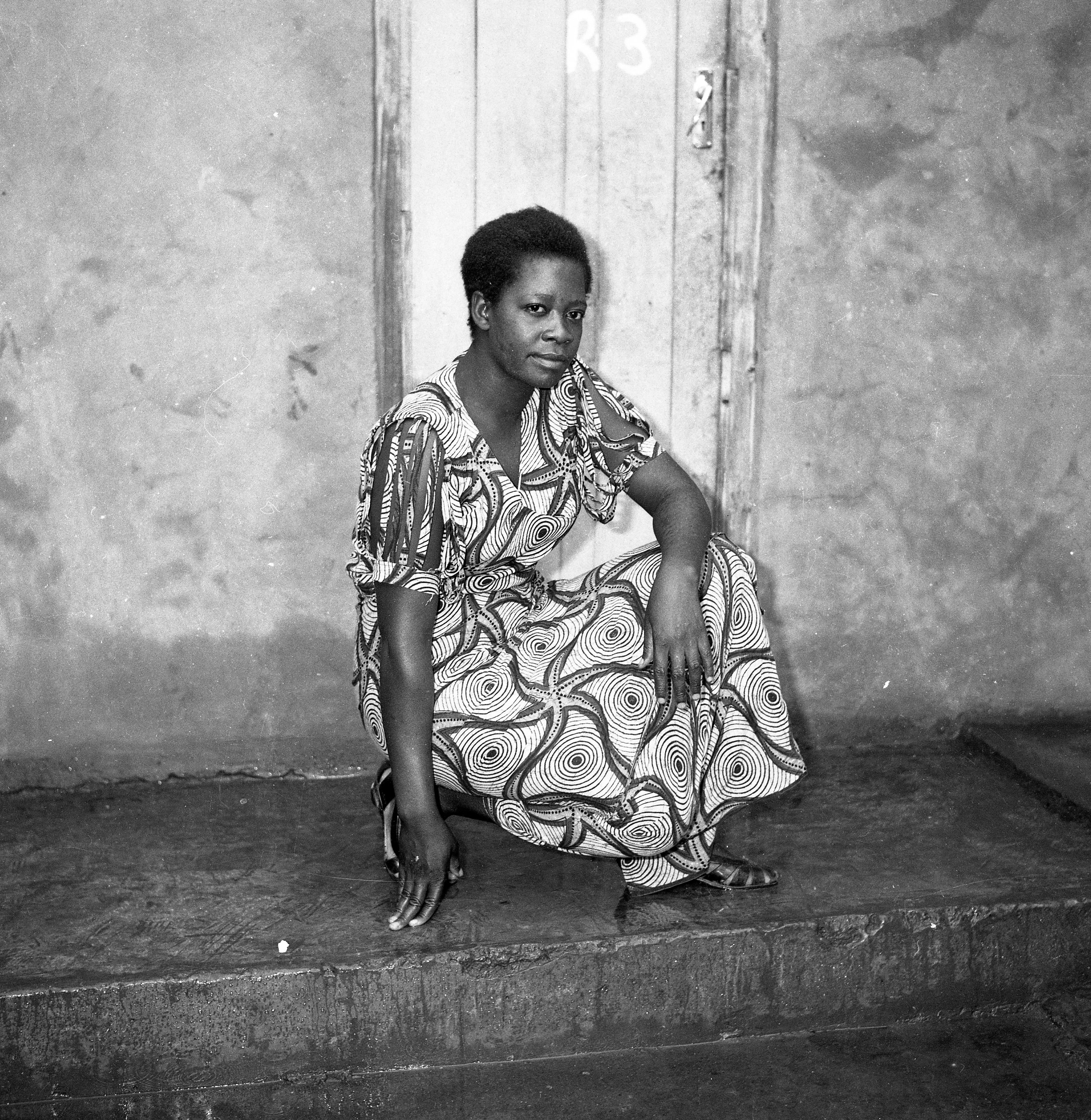 black and white images of people posing for camera