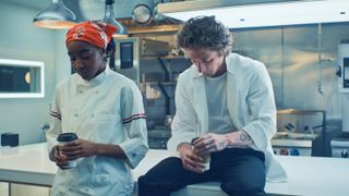 Carmy (Jeremy Allen White) and Sydney (Ayo Edebiri) in the kitchen in &quot;The Bear&quot; season 3