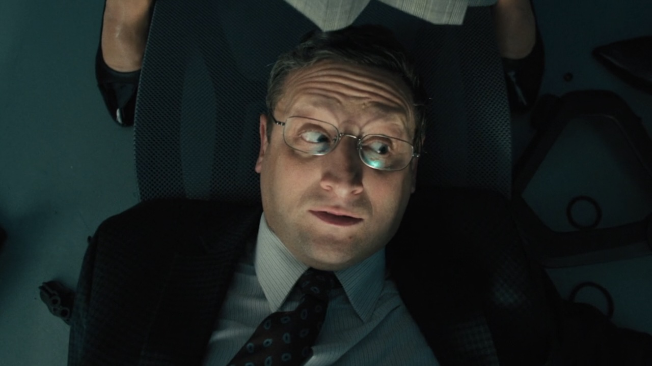 Ron Trosper laying on the ground after chair collapsed on stage in The Chair Company premiere