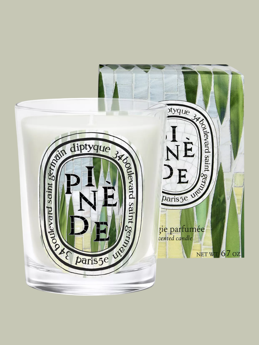 A small pine grove scented candle from Diptyque