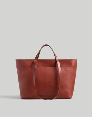 A brown leather Madewell Zip-Top Essential Tote