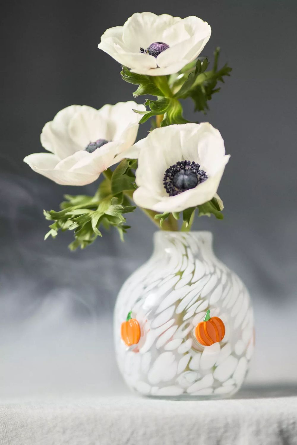 White splatter vase with pumpkin motif