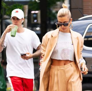 new york, ny may 04 justin bieber sips on green juice when out and about with wife hailey bieber on may 4, 2019 in new york city photo by jackson leegc images