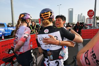 ABU DHABI BREAKWATER UNITED ARAB EMIRATES FEBRUARY 09 LR Lara Gillespie of Ireland and UAE Team ADQ Black intermediate sprint jersey and the sports director Cherie Pridham react after the 3rd UAE Tour Women Stage 4 a 127km stage from Abu Dhabi Fatima Bint Mubarak Ladies Academy to Abu Dhabi Breakwater UCIWWT on February 09 2025 in Abu Dhabi Breakwater United Arab Emirates Photo by Tim de WaeleGetty Images