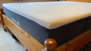 The Nectar Premier Hybrid mattress on a bed