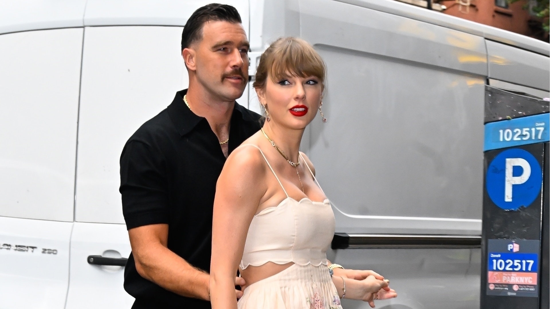 Taylor Swift wearing a white Zimmermann dress in New york City
