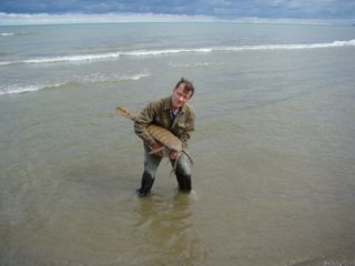 man with sea scorpion