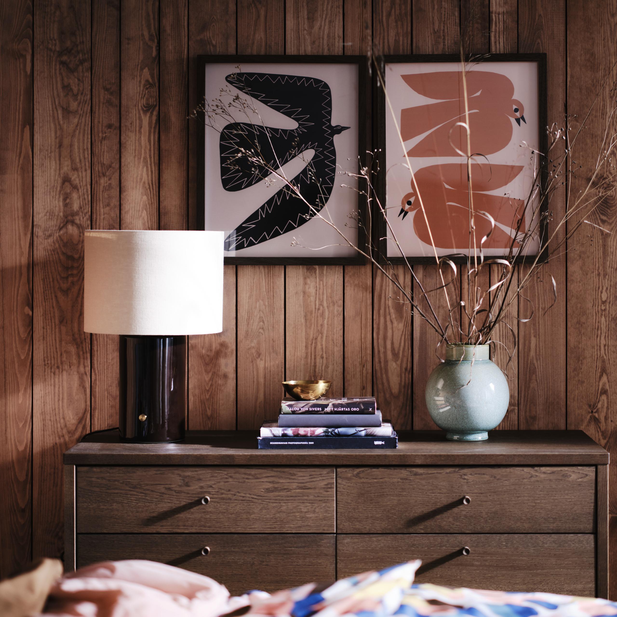 lamp on a chest of drawers