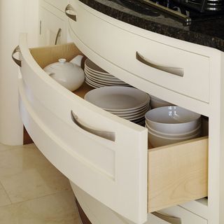 kitchen with deep pull out drawers for storing crockery as well as heavy pots and pans