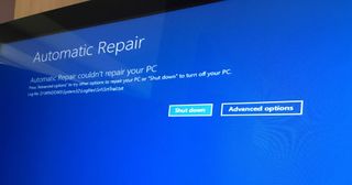 A photo of a monitor displaying the words 'Automatic Repair couldn't repair your PC.'