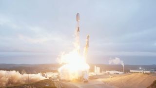 A rocket launches against a cloudy sky.