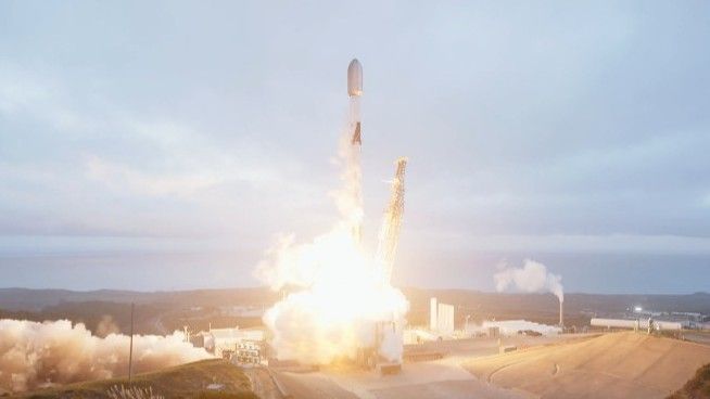 A rocket launches against a cloudy sky.