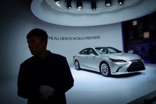 A Lexus ES 300 car is on display at the Beijing Auto Show on April 25, 2018. - Global carmakers touted their latest electric and SUV models in Beijing as they warily welcomed China's promise