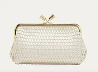 ANYA HINDMARCH Maud Tassel Woven Satin Clutch Bag, $635 (£500) | Bergdorf Goodman