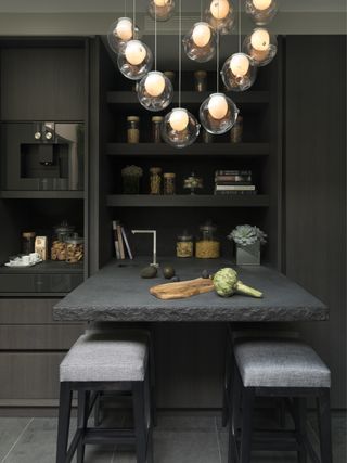 small dark grey kitchen by Tollgard
