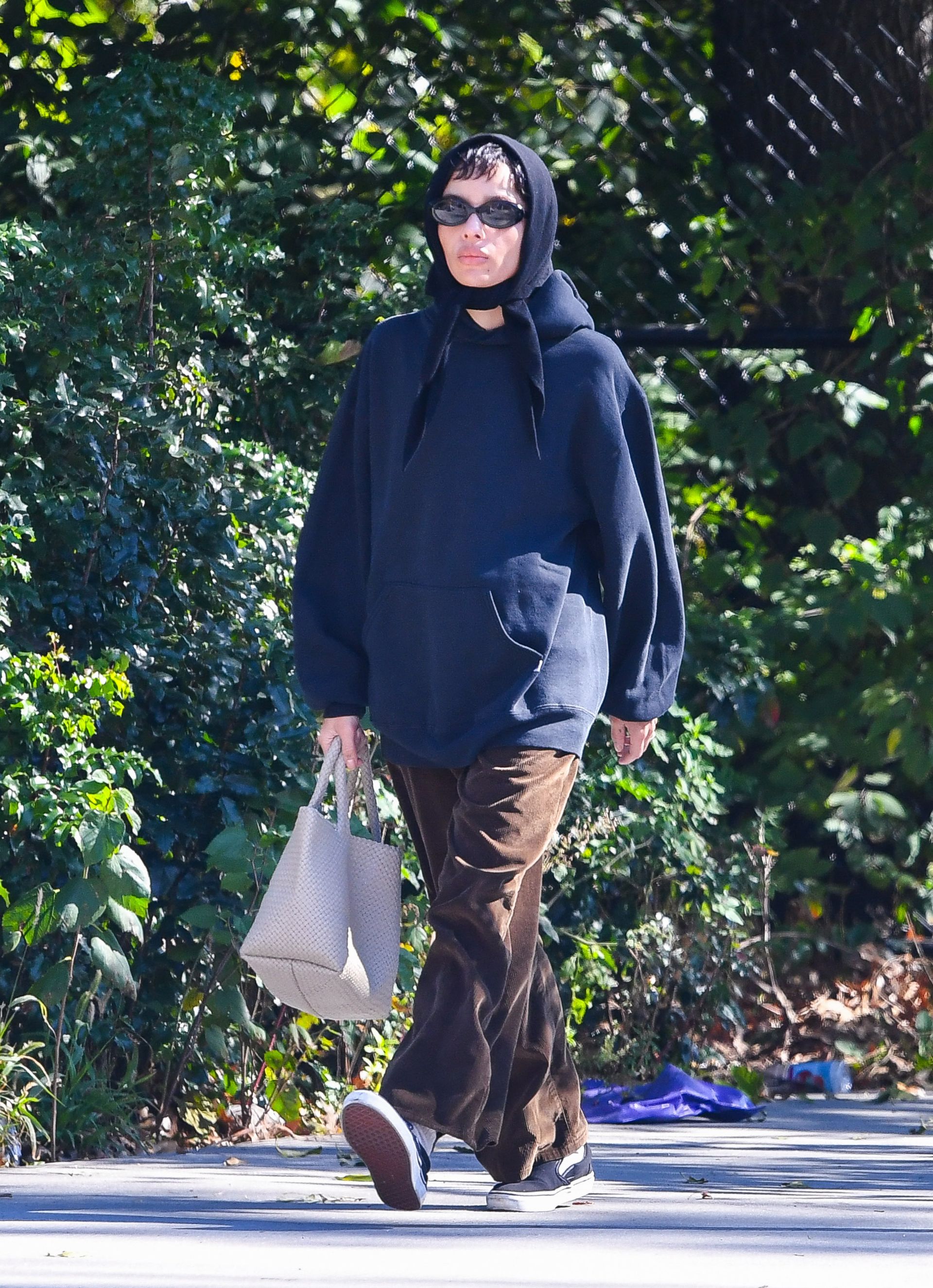 zoe kravitz wearing a triangle scarf