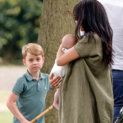 Prince George of Cambridge, Meghan, Duchess of Sussex and Archie Harrison Mountbatten-Windsor 