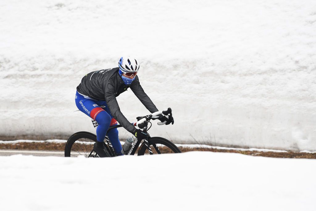 CORTINA DAMPEZZO ITALY MAY 24 Rudy Molard of France and Team Groupama FDJ passing through Passo Giau 2233m during the 104th Giro dItalia 2021 Stage 16 a 153km stage shortened due to bad weather conditions from Sacile to Cortina dAmpezzo 1210m Snow Landscape girodiitalia Giro on May 24 2021 in Cortina dAmpezzo Italy Photo by Tim de WaeleGetty Images