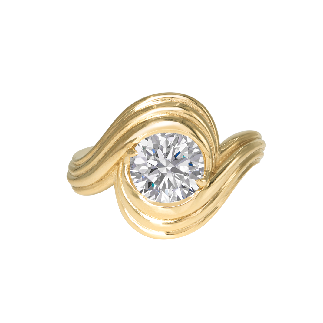 a gold and diamond engagement ring from lylie