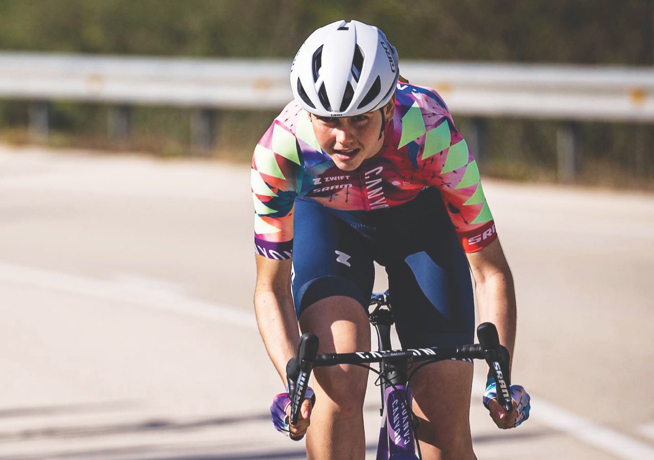 Alex Morrice riding - standing up and wearing her Canyon jersey