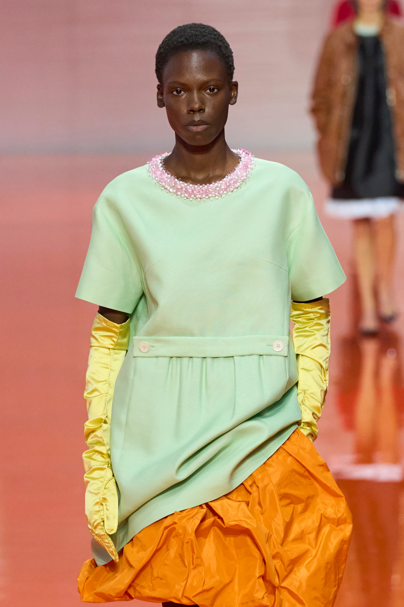 models wearing bead and gem embellished tops on the Prada spring 2026 runway