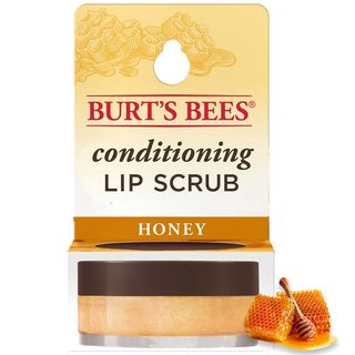 Burt's Bees Natural Conditioning Lip Scrub in yellow packaging next to honey comb