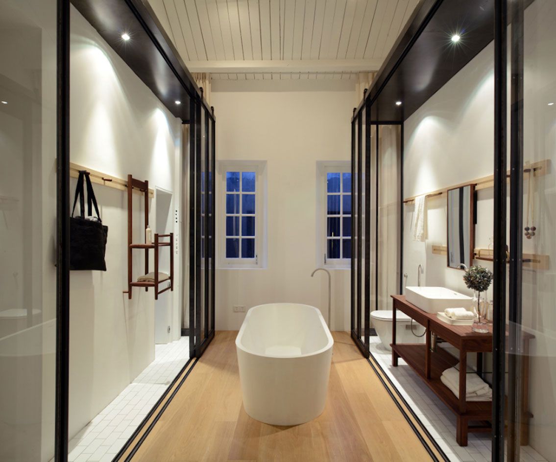 The industrial-look bathroom, a Shaker-inspired walnut shelving system