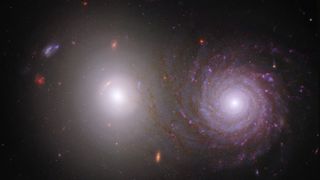 A pair of galaxies in an image combined from observations by the James Webb and Hubble Space Telescopes.