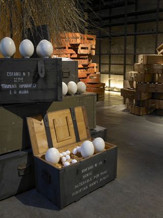 wooden crates paired with ceramic eggs