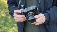 Leica M11-P camera held in hands