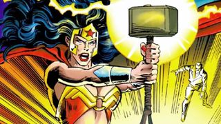 Wonder Woman holds Thor's hammer