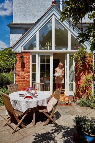 Cut extension costs: conservatory style extension on a victorian house
