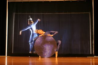 A visual representation of space-time and other astrophysical concepts expressed by AstroDance dancers.