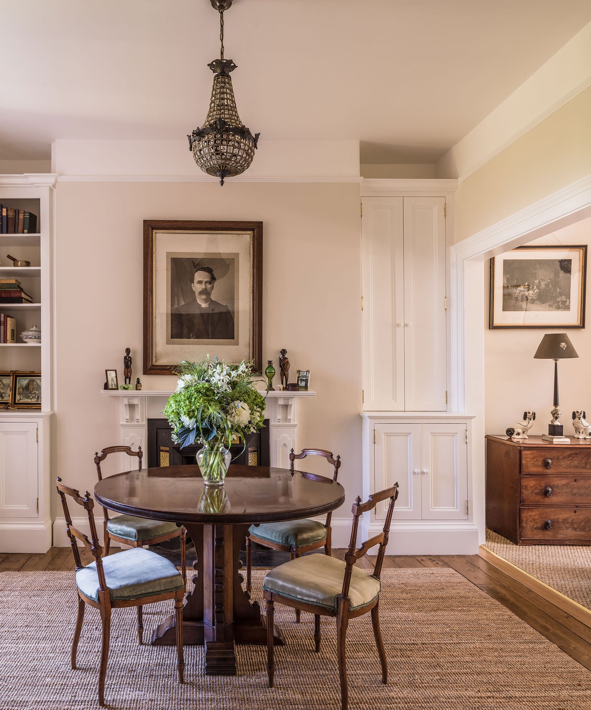 Dining room with a round table in a broken plan room