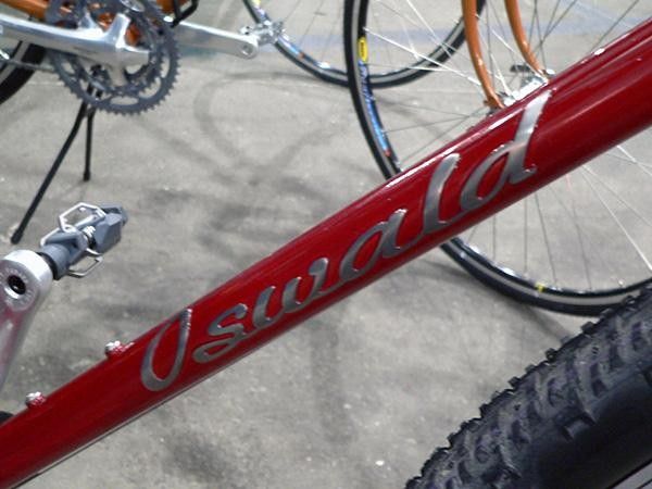 Raised stainless steel logos