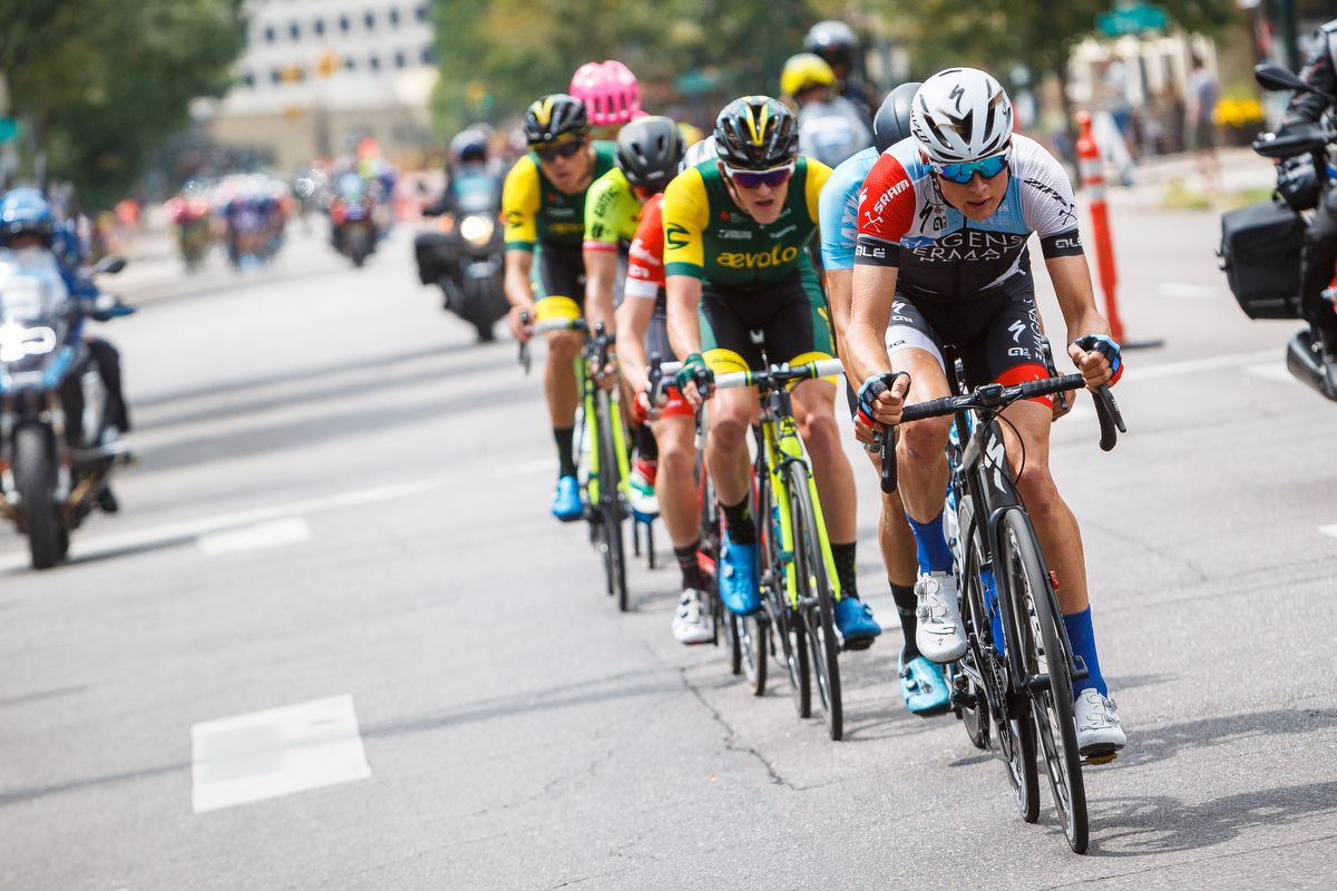At the beginning of lap six a trio of riders jumped out of the pack
