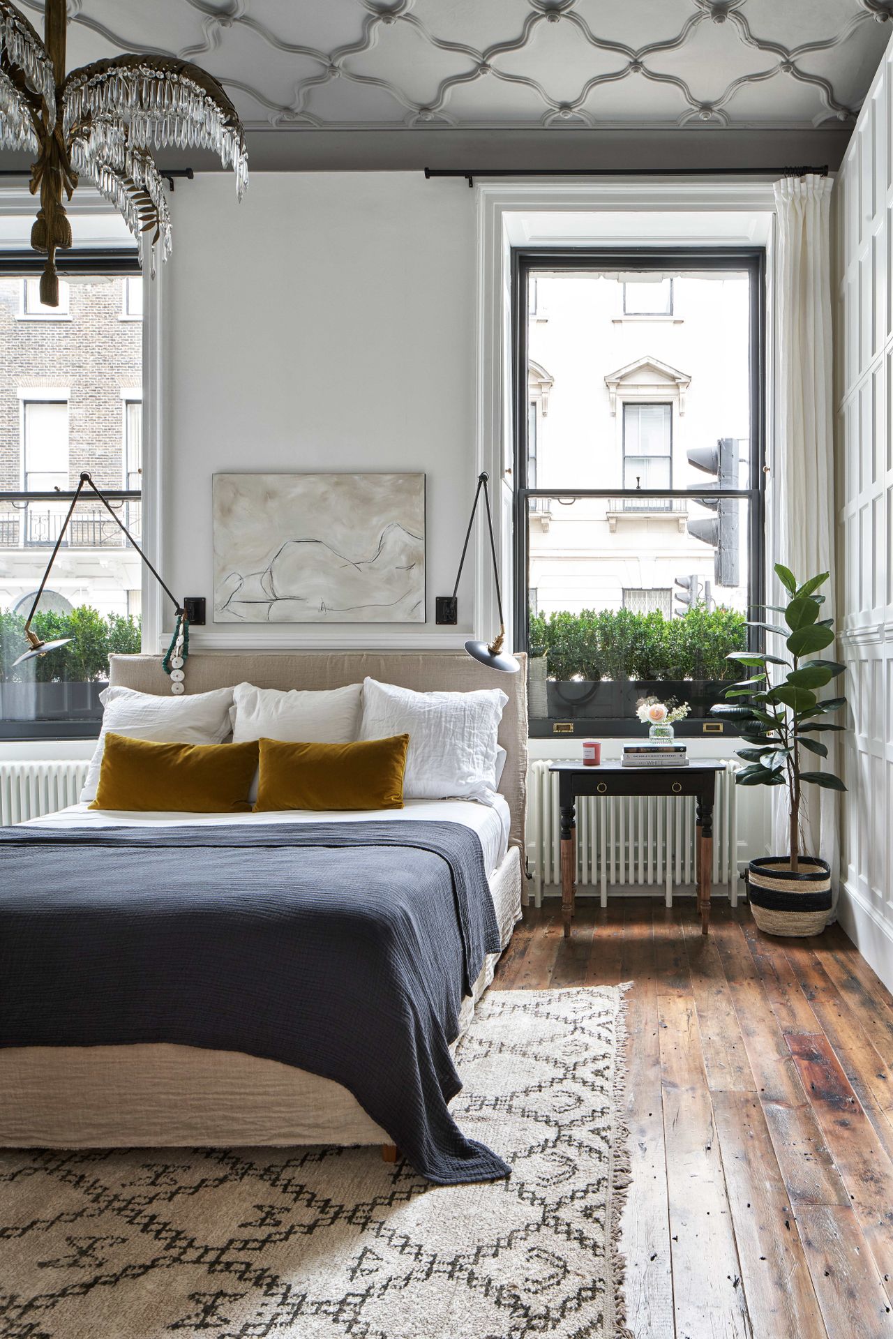 White bedroom with grey painted ceiling